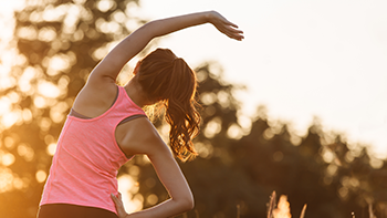 Woman stretching outside